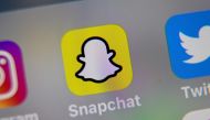  In this file photo illustration taken on October 01, 2019, in Lille, France, shows the logo of mobile app Snapchat displayed on a tablet. (AFP / DENIS CHARLET)