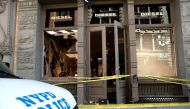 An NYPD van is seen parked outside the Diesel store after it was looted and damaged by some protesters after they participated in a march against the death in Minneapolis police custody of George Floyd, in the Manhattan borough of New York City, U.S., Jun