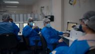 Health professionals work at the Intensive Care Unit (ICU) ward where patients infected with the novel coronavirus, COVID-19, are being treated at the Doctor Ernesto Che Guevara Public Hospital in Marica city, state of Rio de Janeiro, Brazil, on June 5, 2