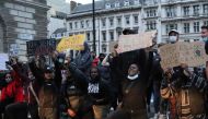 LONDON, ENGLAND - JUNE 03: Protesters take to the streets to march in solidarity with the Black Lives Matter (BLM) movement and protest the killing of George Floyd, an unarmed black man who died last week after being pinned down by a white police officer 