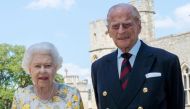 Britain's Queen Elizabeth II and Britain's Prince Philip, Duke of Edinburgh, poses in the quadrangle of Windsor Castle on June 6, 2020. Picture released on June 9, 2020, ahead of Prince Philip’s 99th birthday. Steve Parsons/PA Wire/Pool via REUTERS