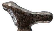 A miniature bird sculpture carved of burnt bone from China's Henan Province dating to about 13,500 ago is seen in this photo released on June 10, 2020. Francesco d'Errico and Luc Doyon/Handout via REUTERS