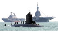 In this file photo taken on June 27, 2005 sailors aboard the French submarine 