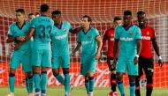 Barcelona's Lionel Messi celebrates scoring their fourth goal with teammates, as play resumes behind closed doors following the outbreak of the coronavirus disease (COVID-19) REUTERS/Albert Gea
