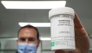 A pharmacist displays a box of Dexamethasone at the Erasme Hospital amid the coronavirus disease (COVID-19) outbreak, in Brussels, Belgium, June 16, 2020. REUTERS/Yves Herman
