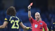 Arsenal's David Luiz is shown a red card by referee Anthony Taylor 