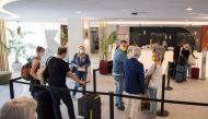 German tourists arrive at the RIU Concordia hotel in Palma de Mallorca on June 15, 2020, as part of a pilot program to reactivate tourism a week before Spain reopens its borders. Spain, one of the world's leading tourist destinations, will next June 21 re