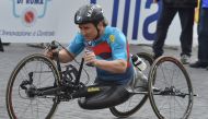 (FILES) In this file photograph taken on April 2, 2017, former racing driver and paracyclist, Italian Alex Zanardi takes part in the 23rd Marathon of Rome. AFP / Andreas SOLARO