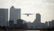 British Airways flight BA3288 takes off as London City Airport restarts commercial flights following lockdown due to the coronavirus disease (COVID-19) outbreak, in London, Britain June 21, 2020. REUTERS/Henry Nicholls