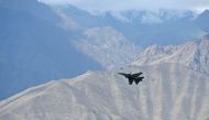 An Indian fighter jet flies over Leh, the joint capital of the union territory of Ladakh, on June 25, 2020.   AFP / Tauseef MUSTAFA
