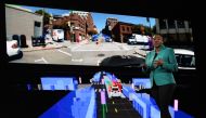 (FILES) In this file photo taken on June 6, 2019 Aicha Evans who is the CEO of the self-driving technology development company Zoox, talks about autonomous cars during a keynote session at the Amazon Re:MARS conference on robotics and artificial intellige