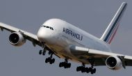 FILE PHOTO: An Air France Airbus A380 aircraft lands at Charles-de-Gaulle airport after its retirement flight, in Roissy, near Paris, June 26, 2020. REUTERS/Christian Hartmann