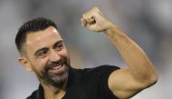 In this file photo taken on October 01, 2019, Sadd's coach Xavi Hernandez reacts after a goal during the first leg of the AFC Champions League semi-finals football match between Qatar's Al Sadd and Saudi' Al Hilal at the Jassim bin Hamad Stadium in the Qa