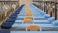 TOPSHOT - Beds are pictured inside a newly built hospital to treat Covid-19 coronavirus patients at the Mahalaxmi Racecourse, in Mumbai on July 7, 2020. / AFP / Punit PARANJPE

