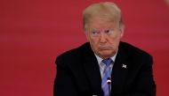 FILE PHOTO: U.S. President Donald Trump listens during a meeting of the American Workforce Policy Advisory Board in the East Room at the White House in Washington, U.S., June 26, 2020. REUTERS/Carlos Barria/File Photo
