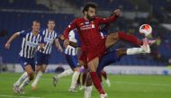 Liverpool's Egyptian midfielder Mohamed Salah controls the ball during the English Premier League football match between Brighton and Hove Albion and Liverpool at the American Express Community Stadium in Brighton, southern England on July 8, 2020. AFP / 