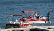 The boat that actor Naya Rivera was using when she went missing is seen with yellow tape as search operations continue on Lake Piru in California, U.S., July 9, 2020. REUTERS/Mario Anzuoni
