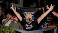 Roger Stone, a longtime friend and adviser of U.S. President Donald Trump, reacts after Trump commuted his federal prison sentence, outside his home in Fort Lauderdale, Florida, U.S. July 10, 2020. REUTERS/Joe Skipper 