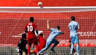 Anfield, Liverpool, Britain - July 11, 2020 Burnley's Johann Berg Gudmundsson shoots against the crossbar, as play resumes behind closed doors following the outbreak of the coronavirus disease (COVID-19) Pool via REUTERS/Phil Noble 
