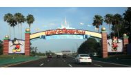 Visitors drive past a sign welcoming them to Walt Disney World on the first day of reopening of the iconic Magic Kingdom theme park in Orlando, Florida, on July 11, 2020.AFP / Gregg Newton / Gregg Newton
