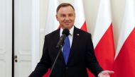 Polish President and presidential candidate of the Law and Justice (PiS) party Andrzej Duda talks to the media after the announcement of the first exit poll results on the second round of the presidential election, at the Presidential Palace in Warsaw, Po