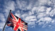 A British national flag, known as the Union Jack, with the words 'THANK YOU NHS' (National Health Service) is caught in an early morning breeze in London, Britain, July 6 2020. REUTERS/Russell Boyce/File Photo