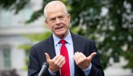 (FILES) In this file photo White House Trade Advisor Peter Navarro speaks to the press about former National Security Advisor John Bolton's upcoming book release, outside of the White House in Washington, DC, on June 18, 2020. / AFP / SAUL LOEB