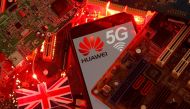 FILE PHOTO: The British flag and a smartphone with a Huawei and 5G network logo are seen on a PC motherboard in this illustration picture taken January 29, 2020. REUTERS/Dado Ruvic/Illustration/File Photo
