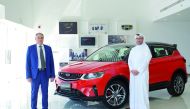 The officials during the opening ceremony of Geely Auto showroom.