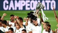 Soccer Football - La Liga Santander - Real Madrid v Villarreal - Alfredo Di Stefano Stadium, Madrid, Spain - July 16, 2020 Real Madrid's Sergio Ramos and teammates celebrate with the trophy after winning La Liga, as play resumes behind closed doors follow