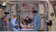 FILE PHOTO: NASA astronaut Bob Behnken arrives at the International Space Station aboard SpaceX's Crew Dragon capsule in this still image taken from video May 31, 2020. NASA/Handout via REUTERS
