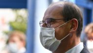 French Prime Minister Jean Castex, wearing a face mask, speaks after attending a city council and resigning from his mayor's office, in Prades, southwestern France, on July 18, 2020.  / AFP / GEORGES GOBET