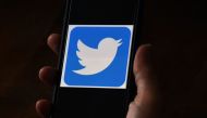 (FILES) In this file photo illustration, a Twitter logo is displayed on a mobile phone on May 27, 2020, in Arlington, Virginia. AFP / Olivier DOULIERY