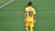 Messi walks on the pitch during the Spanish league football match between Deportivo Alaves and FC Barcelona at the Mendizorroza stadium in Vitoria on July 19, 2020. / AFP / ANDER GILLENEA