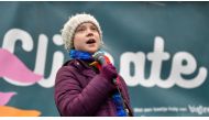 (FILES) In this file photo taken on March 6, 2020 Swedish environmentalist Greta Thunberg speaks during a 