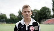 Ivan Zaborovsky, goalkeeper of FC Znamya Truda youth team, who recently survived a lightning strike during a training session, poses for a picture at a soccer stadium in Orekhovo-Zuyevo, Russia July 21, 2020. REUTERS/Tatiana Gomozova