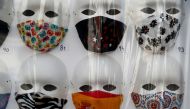 Protective masks are displayed in a store, amid the coronavirus disease (COVID-19) outbreak, in Madrid, Spain, June 30, 2020. REUTERS/Susana Vera/File Photo