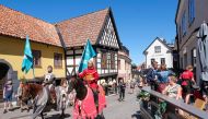 Thomas Lindgren (L) on the horse Soprano and Anders Mansson on Sara, both from the knight society Tornamenteum, patrol the city of Visby on the Swedish island of Gotland on July 23, 2020. Sweden OUT / AFP / TT NEWS AGENCY / TT News Agency / Soren ANDERSSO
