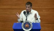 This handout photo taken and released on July 27, 2020 by the Philippines' Presidential Photo Division (PPD) shows Philippine President Rodrigo Duterte delivering his annual State of the Nation Address in congress in Manila. AFP PHOTO / PRESIDENTIAL PHOTO