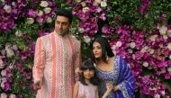 FILE PHOTO: Actor Abhishek Bachchan, his wife actress Aishwarya Rai and their daughter Aaradhya pose during a photo opportunity at the wedding ceremony of Akash Ambani, son of the Chairman of Reliance Industries Mukesh Ambani, at Bandra-Kurla Complex in M