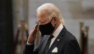 Democratic presidential candidate, former Vice President Joe Biden salutes at the flag-draped casket of the late Rep. John Lewis, D-Ga., a key figure in the civil rights movement and a 17-term congressman from Georgia, as he lies in state at the Capitol i