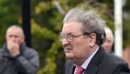 FILE PHOTO: Former SDLP leader, John Hume, arrives for the funeral mass of former Bishop Edward Daly at St. Eugene's Cathedral in Londonderry, Northern Ireland August 11, 2016. REUTERS/Clodagh Kilcoyne/File Photo