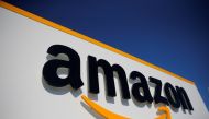 FILE PHOTO: The logo of Amazon is seen at the company logistics center in Lauwin-Planque, northern France, April 22, 2020. REUTERS/Pascal Rossignol/File Photo
