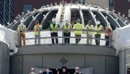 Andrew Cuomo, Governor of New York State, bows his head in prayer at the St. Nicolas National Shrine during an event to mark the roof going onto the building in the Manhattan borough of New York City, New York, U.S., August 3, 2020. REUTERS/Carlo Allegri