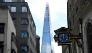 A message thanking health workers of the NHS is seen on office windows with the Shard skyscraper behind, as the outbreak of the coronavirus disease (COVID-19) continues, in London, Britain, August 6, 2020. REUTERS/Toby Melville