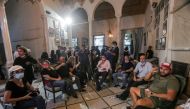 Lebanese protesters enter the Ministry of Foreign Affairs in Beirut on August 8, 2020, after they stormed the ministry as anger exploded over a deadly blast that made hundreds of thousands homeless and shocked the world. As security forces focused their a