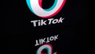 This file photo taken on November 21, 2019 shows the logo of the social media video sharing app Tiktok displayed on a tablet screen in Paris./ AFP / Lionel BONAVENTURE