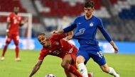 Bayern Munich's Spanish midfielder Thiago Alcantara (L) fights for the ball with Chelsea's English midfielder Mason Mount during the UEFA Champions League, second-leg round of 16, football match FC Bayern Munich v FC Chelsea in Munich, southern Germany on