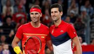 January 12, 2020 Spain's Rafael Nadal and Serbia's Novak Djokovic pose ahead of their Final singles match REUTERS/Edgar Su/File Photo