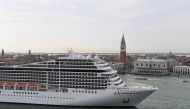 In this file photo taken on June 9, 2019 The MSC Magnifica cruise ship is seen from San Maggiore's bell tower leaving in the Venice Lagoon.  / AFP / Miguel MEDINA